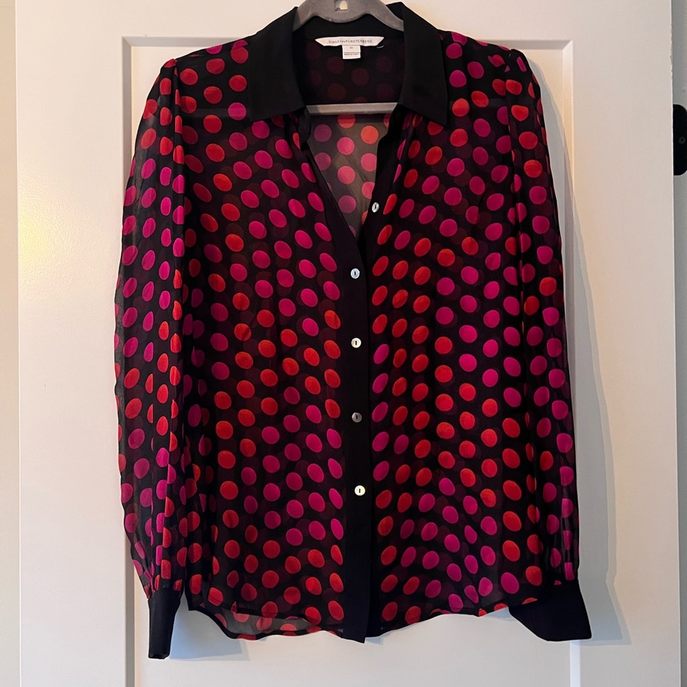 Diane Von Furstenburg sheer polka dot blouse.